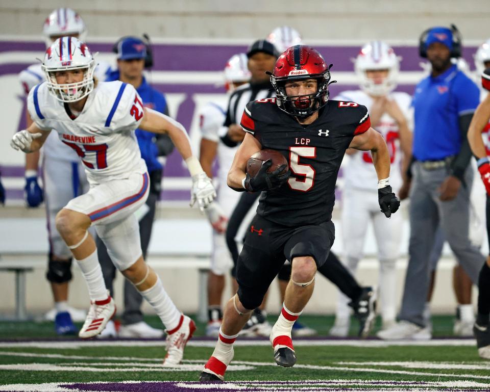 Lubbock-Cooper's Judge Thomason (5) runs with the ball during the game against Grapevine, Friday, Nov. 26, 2021, at Wildcat Stadium in Abilene, Texas.