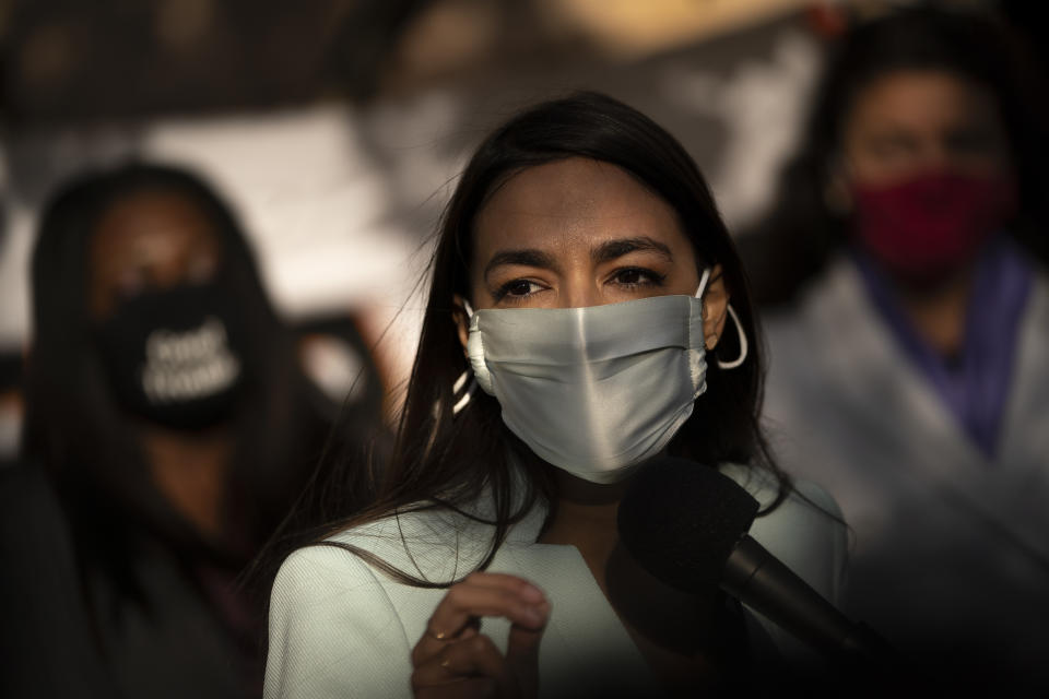 WASHINGTON, DC - NOVEMBER 19: U.S. Rep. Alexandria Ocasio-Cortez (D-NY) speaks outside of the Democratic National Committee headquarters on November 19, 2020 in Washington, DC. Rep. Ocasio-Cortez and others called on the incoming administration of President-elect Joe Biden to take bold action on issues of climate change and economic inequalities. (Photo by Drew Angerer/Getty Images)