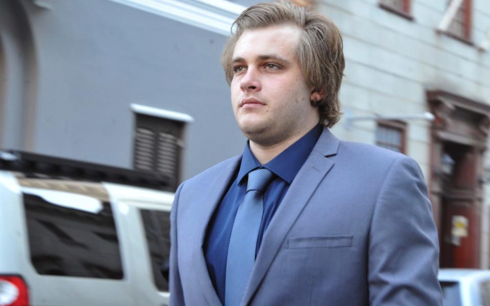 Henri van Breda arrives at the High Court in Cape Town, South Africa, Monday, April 24, 2017 - AP