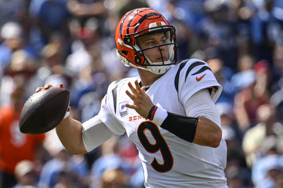 Cincinnati Bengals quarterback Joe Burrow (9) works in the pocket against the Tennessee Titans during the first half of an NFL football game, Sunday, Oct. 1, 2023, in Nashville, Tenn. (AP Photo/John Amis)