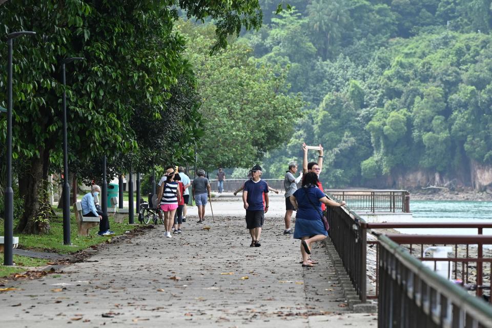 People visit Labrador park in Singapore on April 6, 2021. (Photo by ROSLAN RAHMAN / AFP) (Photo by ROSLAN RAHMAN/AFP via Getty Images)