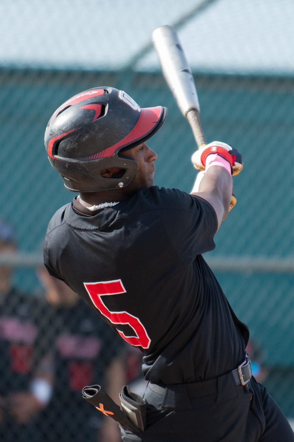 Oak Hills’ Jacob Webster connects for a double during the third inning against Sultana on Wednesday, March 13, 2024 in Hesperia. Oak Hills beat Sultana 13-6 in Mojave River League play.