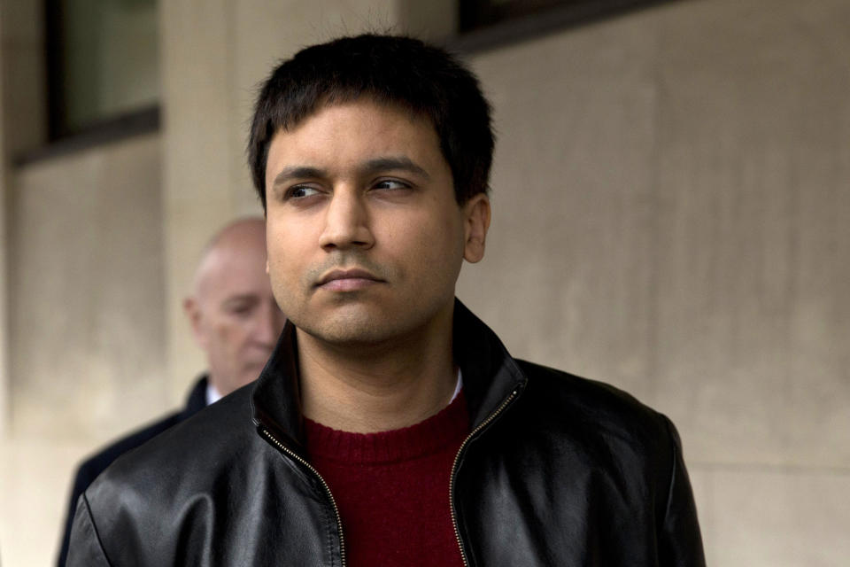 FILE - In this March 23, 2016 file photo, British futures trader Navinder Singh Sarao leaves after the ruling in his extradition hearing at Westminster Magistrates Court in London. A U.S. judge on Tuesday, Jan. 28, 2020, sentenced Navinder Singh Sarao, a socially awkward math whiz-turned-futures trader who helped trigger a U.S. stock market &quot;flash crash&quot; from his parents&#39; suburban London home to time served and a year&#39;s home confinement, sparing him imprisonment after prosecutors praised his cooperation and said his crimes were unmotivated by greed. (AP Photo/Matt Dunham, File)