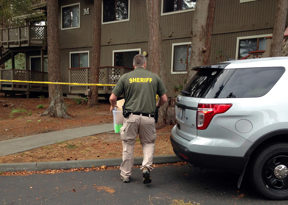 <p>Investigators are seen at the apartment complex that has been tied to Arcan Cetin, the suspected Cascade Mall shooter, in Oak Harbor, Wash., Sunday, Sept. 25, 2016. (AP Photo/Martha Bellisle) </p>