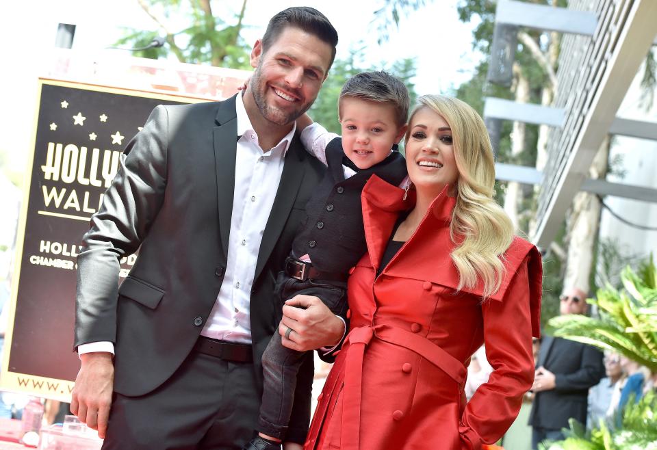 carrie underwood with her husband and son