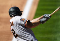 San Francisco Giants' Alex Dickerson connects for a double off Colorado Rockies starting pitcher Chi Chi Gonzalez in the fourth inning of a baseball game Wednesday, Sept. 2, 2020, in Denver. (AP Photo/David Zalubowski)