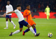 Soccer Football - International Friendly - Netherlands vs England - Johan Cruijff Arena, Amsterdam, Netherlands - March 23, 2018 England’s Alex Oxlade-Chamberlain in action with Netherlands' Georginio Wijnaldum REUTERS/Michael Kooren