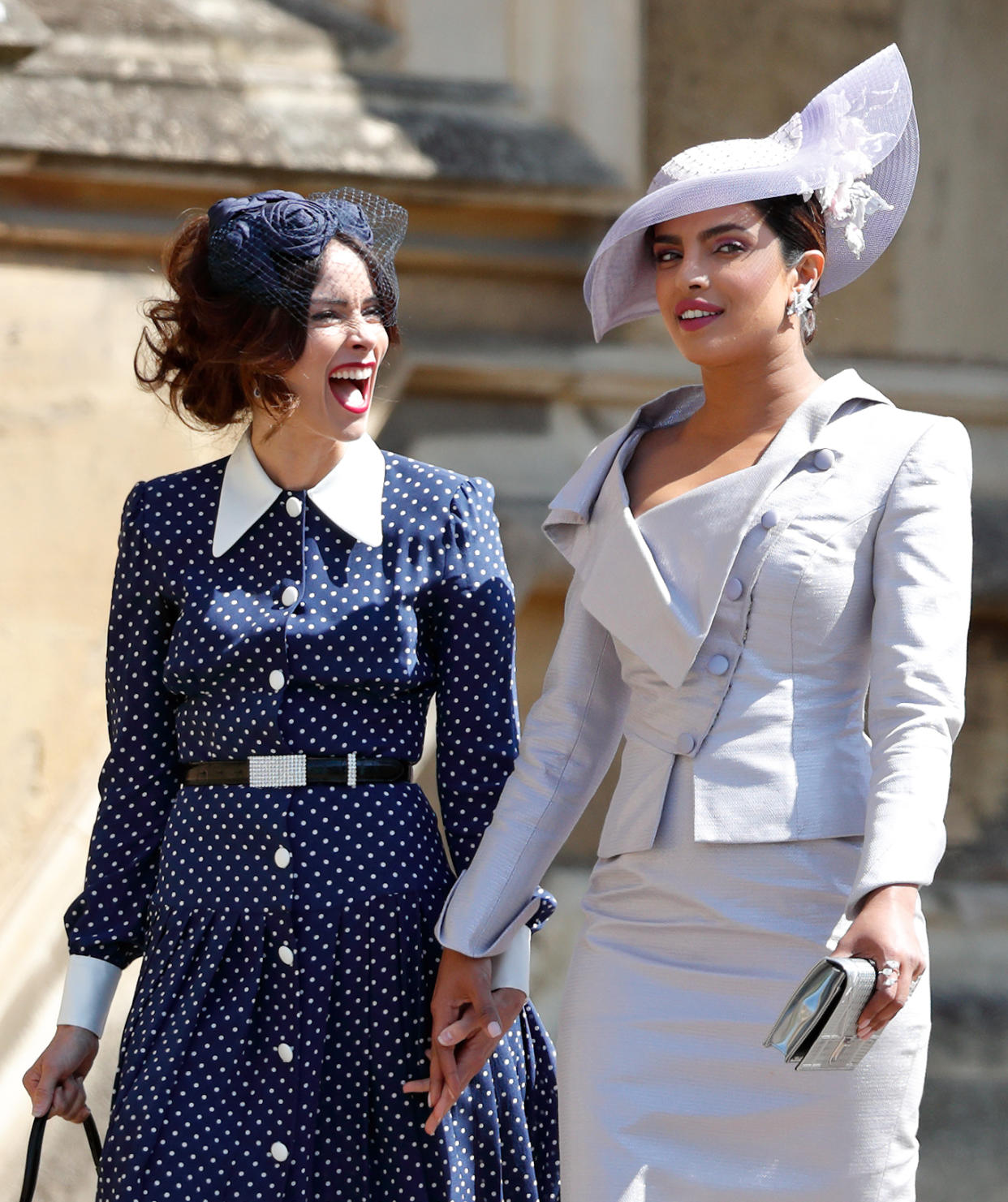 WINDSOR, UNITED KINGDOM - MAY 19: (EMBARGOED FOR PUBLICATION IN UK NEWSPAPERS UNTIL 24 HOURS AFTER CREATE DATE AND TIME) Abigail Spencer and Priyanka Chopra attend the wedding of Prince Harry to Ms Meghan Markle at St George's Chapel, Windsor Castle on May 19, 2018 in Windsor, England. Prince Henry Charles Albert David of Wales marries Ms. Meghan Markle in a service at St George's Chapel inside the grounds of Windsor Castle. Among the guests were 2200 members of the public, the royal family and Ms. Markle's Mother Doria Ragland. (Photo by Max Mumby/Indigo/Getty Images)