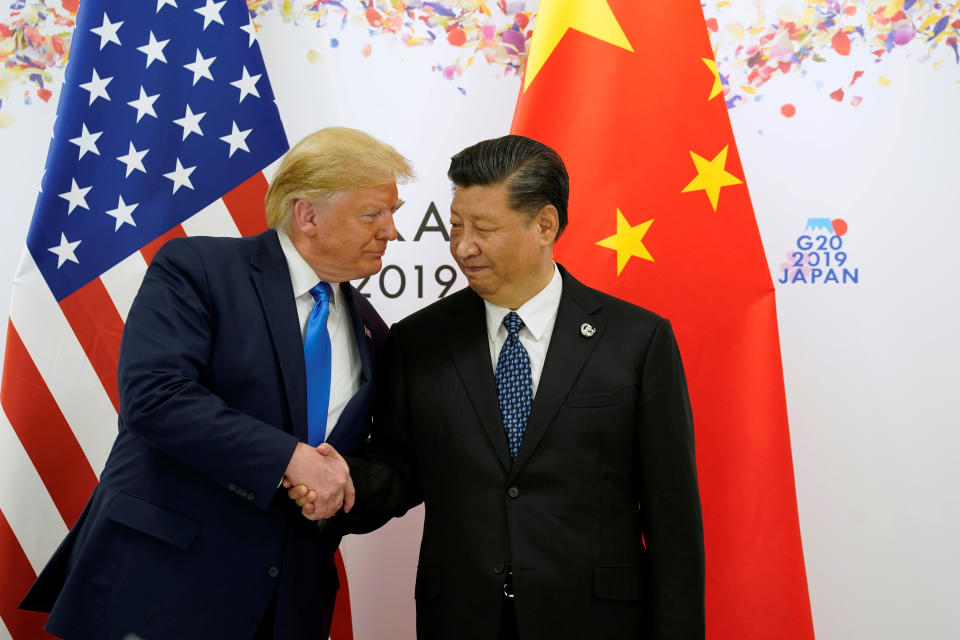 U.S. President Donald Trump shakes hands with China's President Xi Jinping before starting their bilateral meeting during the G20 leaders summit in Osaka, Japan, June 29, 2019. REUTERS/Kevin Lamarque     TPX IMAGES OF THE DAY