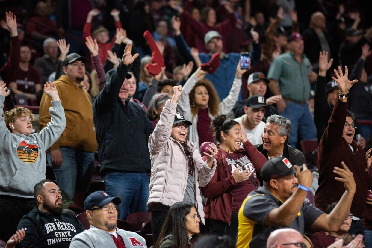 Aggie fans cheer during a college basketball game on Thursday, Jan. 18, 2024, at Pan American Center.