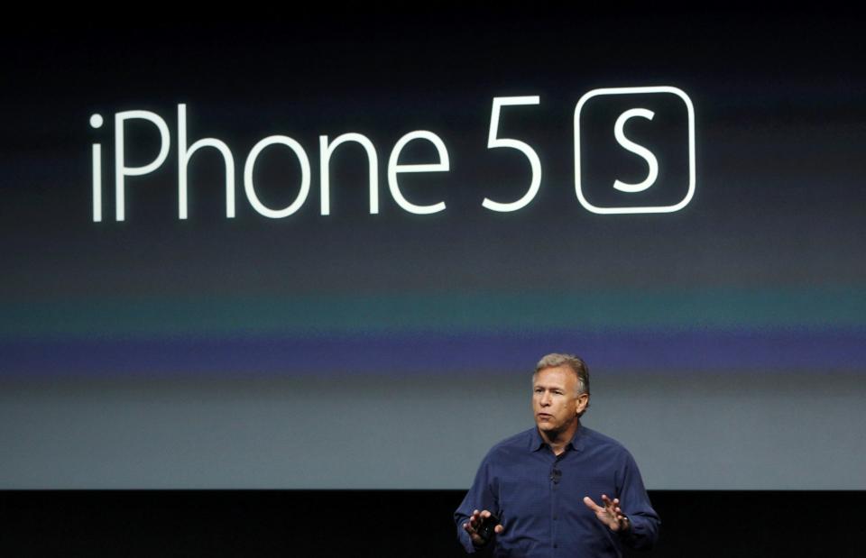 Phil Schiller, senior vice president of worldwide marketing for Apple Inc, talks about the new iPhone 5S at Apple Inc's media event in Cupertino, California September 10, 2013. REUTERS/Stephen Lam (UNITED STATES - Tags: BUSINESS SCIENCE TECHNOLOGY BUSINESS TELECOMS)