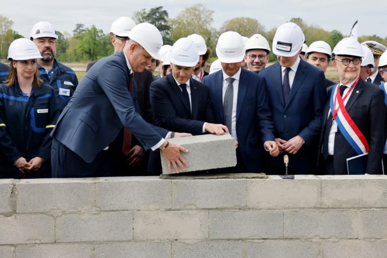 'Defence industries will play a growing role,' said French President Emmanuel Macron (centre) (Ludovic MARIN)