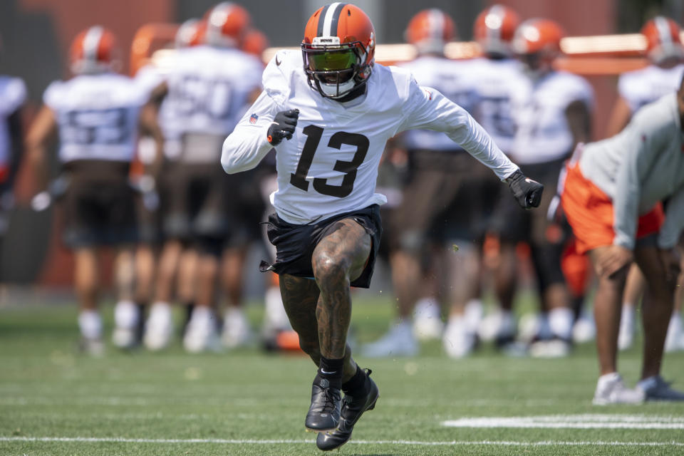 FILE - Cleveland Browns wide receiver Odell Beckham Jr. (13) runs a route during NFL football practice in Berea, Ohio, in this Wednesday, July 28, 2021, file photo. Beckham Jr.'s comeback is in its final days, but the Browns star wide receiver didn't commit to playing Sunday against the Chicago Bears. “We'll see,” Beckham said, shrugging his shoulders when pressed about his status for Cleveland's third game. (AP Photo/David Dermer, File)