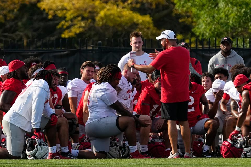 Aug 1, 2024; Columbus, OH, USA; Ohio State Buckeyes head coach Ryan Day addresses his team during football camp at the Woody Hayes Athletic Complex.