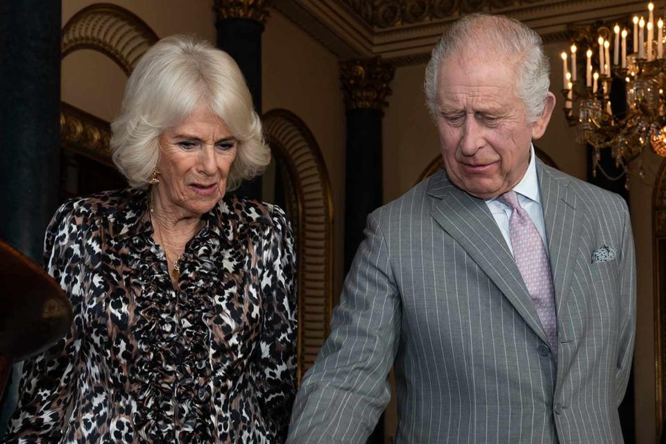 <p>Aaron Chown - WPA Pool/Getty</p> Queen Camilla and King Charles attend a reception for Kenyan diaspora at Buckingham Palace before their state visit to the African country next week.