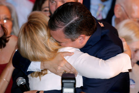 Republican U.S. Senator Ted Cruz hugs his wife Heidi Cruz during his election night party in Houston, Texas, U.S. November 6, 2018. REUTERS/Jonathan Bachman