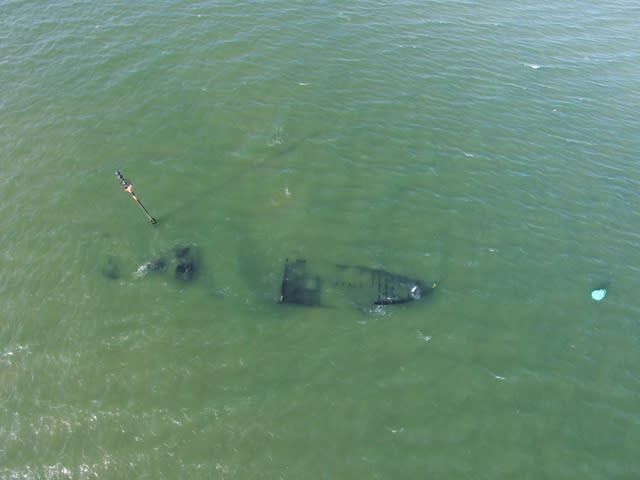 Aerial images show WW1 wreck emerging from sea