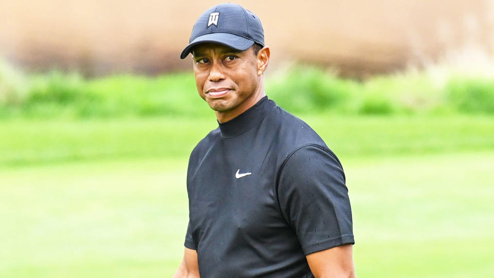 Tiger Woods (pictured) in between holes at the Sherwood Country Club.