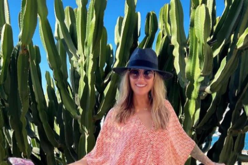 Sally was seen ejoying her time in Ibiza -Credit:Sally Carman Instagram