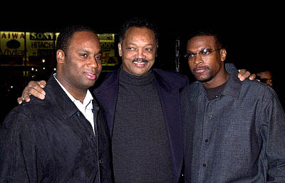 Rev. Jesse Jackson with his son Jonathan and Chris Tucker at the Hollywood premiere of Ali