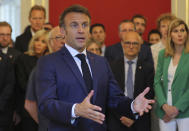 French President Emmanuel Macron delivers a speech as he meets rescue forces in Annecy, French Alps, Friday, June 9, 2023. A man with a knife stabbed four young children at a lakeside park in the French Alps on Thursday June 8, 2023, assaulting at least one in a stroller repeatedly. Authorities said the children, between 22 months and 3 years old, suffered life-threatening injuries, and two adults were also wounded. (Denis Balibouse/Pool via AP)