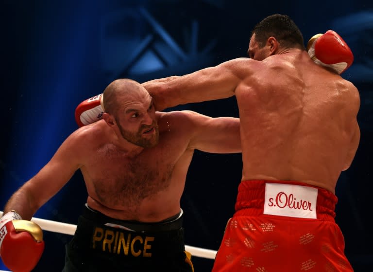 Tyson Fury (L) celebrated his victory over world heavyweight boxing champion Wladimir Klitschko, by singing Aerosmith's "Don't Want to Miss a Thing" in the ring, which he dedicated to his wife, Paris