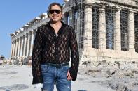 <p>Mickey Rourke visits the Acropolis in Athens, Greece on Thursday.</p>