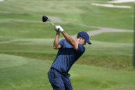 Adam Scott, of Australia, hits from the 13th tee during the first round of the St. Jude Championship golf tournament Thursday, Aug. 11, 2022, in Memphis, Tenn. (AP Photo/Mark Humphrey)