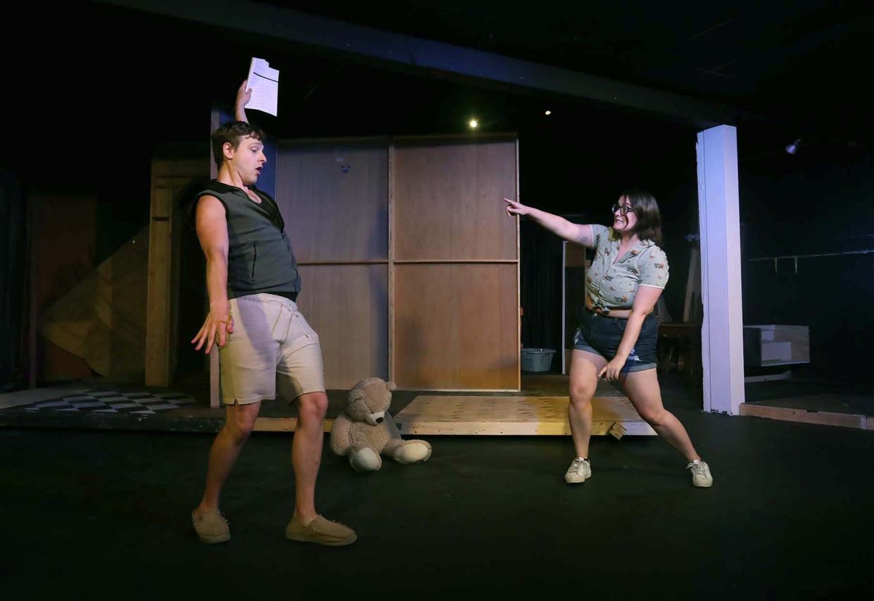 Robert Kowalewski, left, and Braelin Andrzejewski rehearse a scene from the two-person chamber musical "John & Jen" at Western Reserve Playhouse. They are a real-life couple starring in the two-person show, which has been rarely produced in the area.