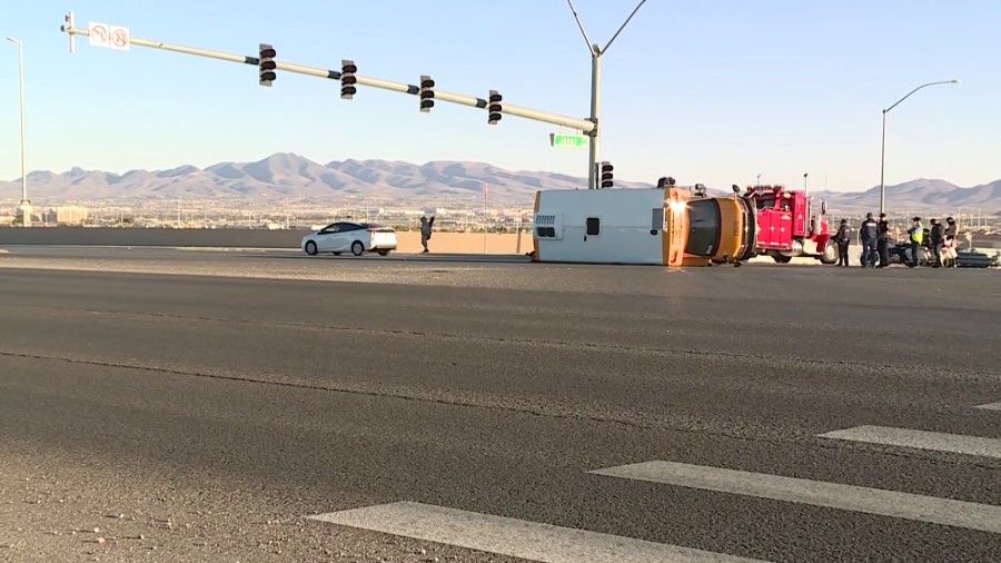 In Nov. of 2023, a school bus flipped on its side in a multi-vehicle crash, causing a passenger to go airborne. It happened at the intersection of Blue Diamond Road and Jones Boulevard. (KLAS)