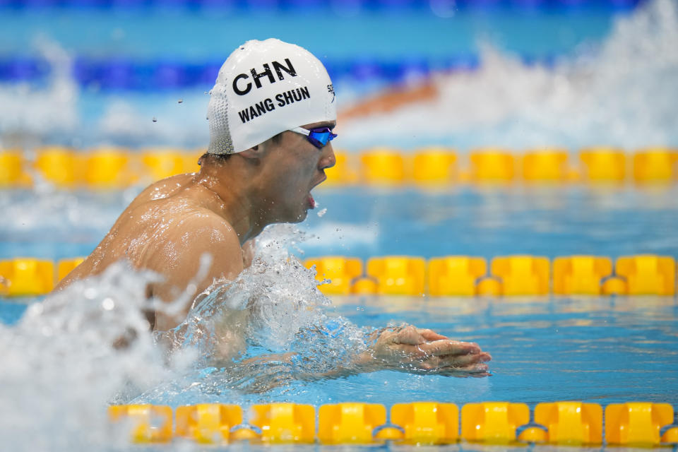 Shun Wang, of China, swims to win the gold medal in the men's 200-meter individual medley final at the 2020 Summer Olympics, Friday, July 30, 2021, in Tokyo, Japan. (AP Photo/Jae C. Hong)