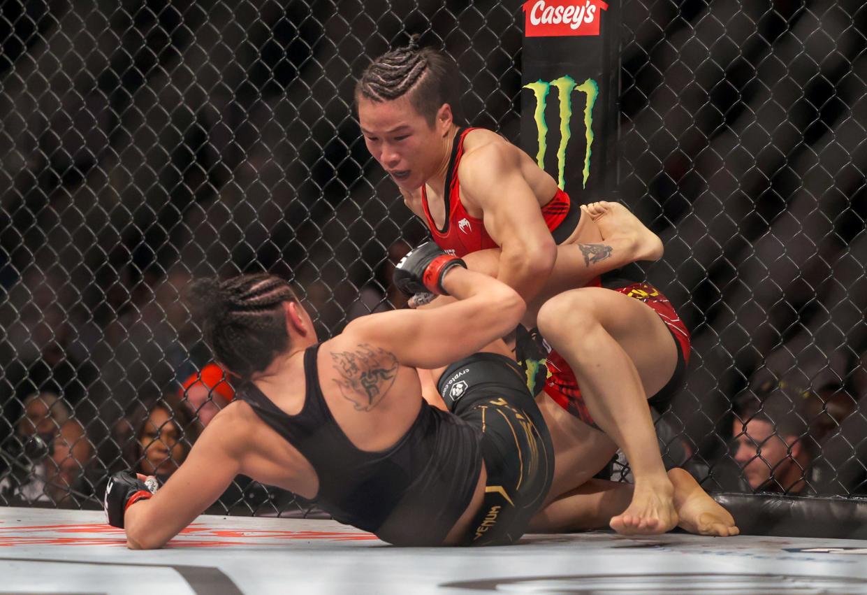 Nov 12, 2022; New York, NY, USA; Carla Esparza (red gloves) and Zhang Weili (blue gloves) during UFC 281 at Madison Square Garden. Mandatory Credit: Jessica Alcheh-USA TODAY Sports