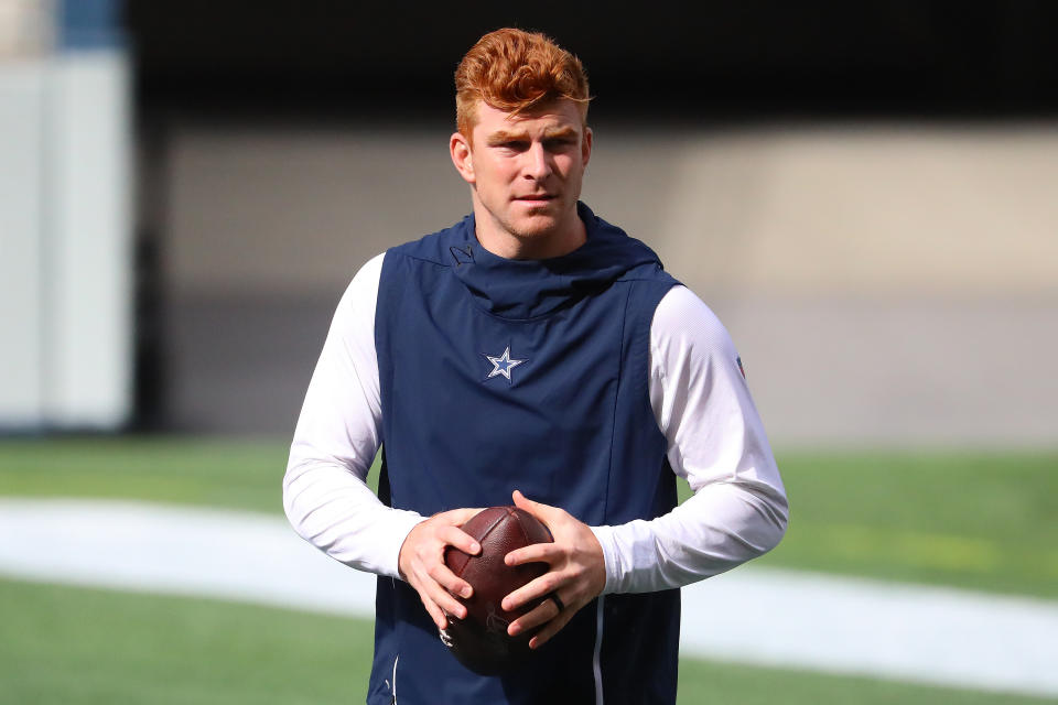 Andy Dalton #14 of the Dallas Cowboys looks on before their game against the Seattle Seahawks at CenturyLink Field on September 27, 2020 in Seattle, Washington. (Photo by Abbie Parr/Getty Images)