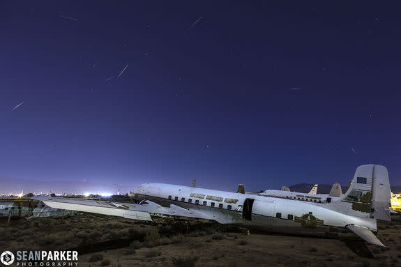 Astrophotographer Sean Parker produced this image of Quandrantid meteors over Tucson, AZ, on Jan. 3, 2013. He writes: "The boneyard [aircraft graveyard] is run by the [Davis-Monthan] Air Force base which requires clearance, and is surrounded by
