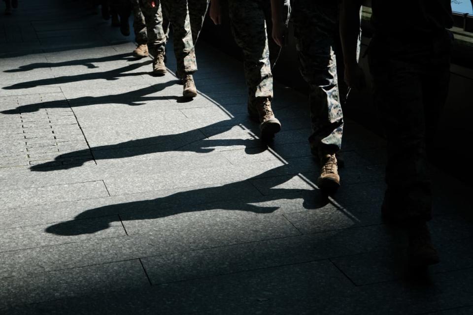 NEW YORK, NEW YORK – MAY 25: Members of the Marine Corps gather at Ground Zero in Manhattan after a run through the streets during Fleet Week in the city on May 25, 2023 in New York City. Nine ships, including one each from Italy, the United Kingdom and Canada paraded into New York Harbor yesterday for the start of the annual event which includes public ship tours, ceremonies and naval and military educational events.
