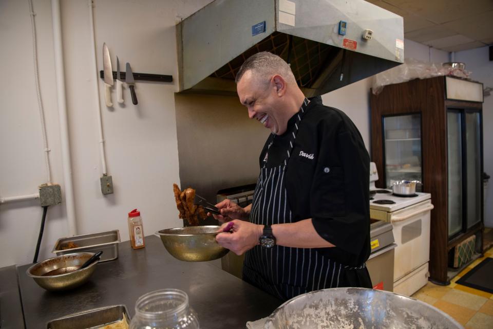 David Moore owner of Moore's Spicy Fried Chicken stands in his kitchen in Hendersonville, Tenn., Thursday, March 7, 2024.