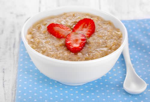 <p>“Oatmeal is hard to beat from a nutrition standpoint,” Glassman says. “It’s got fiber to keep you full, and as a complex carb, it prompts your brain to produce serotonin — a feel-good chemical that helps you <a href="https://www.womansday.com/health-fitness/wellness/g841/stress-relief-tips/" rel="nofollow noopener" target="_blank" data-ylk="slk:deal with stress;elm:context_link;itc:0;sec:content-canvas" class="link ">deal with stress</a> [that in turn helps prevent <a href="https://www.womansday.com/health-fitness/nutrition/a5364/are-you-an-emotional-eater-112690/" rel="nofollow noopener" target="_blank" data-ylk="slk:emotional eating;elm:context_link;itc:0;sec:content-canvas" class="link ">emotional eating</a>].” Plus, a study published in the journal <em><a href="https://www.ncbi.nlm.nih.gov/pmc/articles/PMC4757923/" rel="nofollow noopener" target="_blank" data-ylk="slk:Nutrition Reviews;elm:context_link;itc:0;sec:content-canvas" class="link ">Nutrition Reviews</a></em> concluded that the beta-glucans, a type of heart-healthy soluble fiber, found in <a href="https://www.womansday.com/health-fitness/nutrition/a5589/healthy-snack-idea-oatmeal-117863/" rel="nofollow noopener" target="_blank" data-ylk="slk:oatmeal;elm:context_link;itc:0;sec:content-canvas" class="link ">oatmeal</a> helps regulate appetite. Win-win! </p><p><strong>Get the recipe at <a href="https://nutritiouslife.com/recipes/supercharged-oatmeal/" rel="nofollow noopener" target="_blank" data-ylk="slk:Nutritious Life;elm:context_link;itc:0;sec:content-canvas" class="link ">Nutritious Life</a>.</strong><br></p>