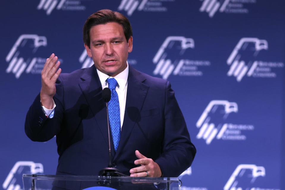 Florida Gov. Ron DeSantis speaks from a lectern.