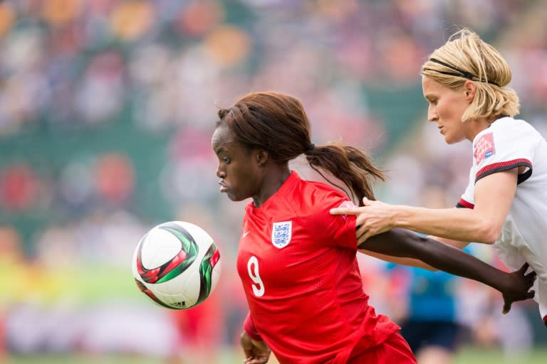 British MP Damian Collins's committee recently delved into racism and bullying allegations made by England women's international footballer Eni Aluko (C)