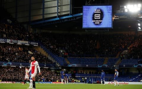 General view as the big screen displays the VAR decision to disallow a goal scored by Chelsea's Cesar Azpilicueta - Credit: REUTERS