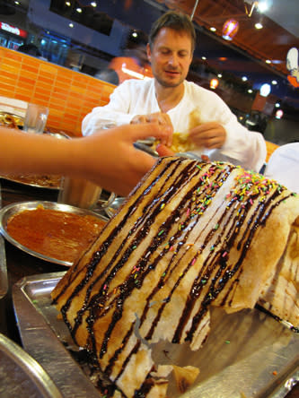 Noma restaurant owner Claus Meyer moments before he demolished the chocolate prata at Casuarrina. (makansutra)