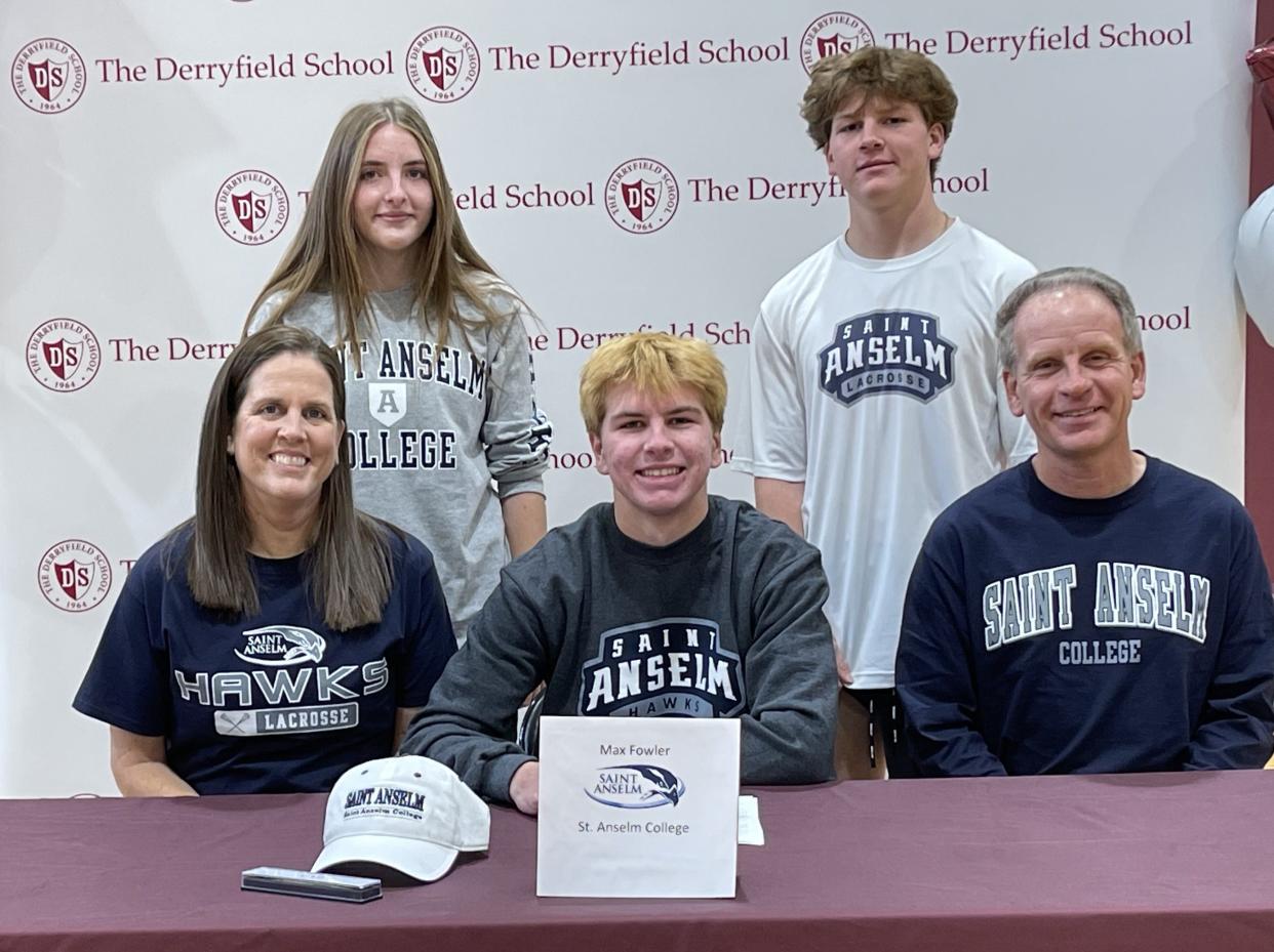 Hampton Falls resident and Derryfield School senior Max Fowler, center, recently signed his letter of commitment to play men's lacrosse at Saint Anselm College. Fowler is joined by his parents, Mike and Tina; his sister, McKinley; and brother, Connor.