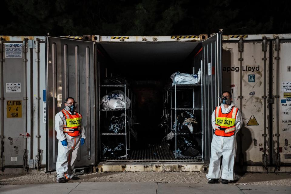 At a military base in Ramla, Israel, bodies of civilians killed in the Hamas militant attack are placed in temporary storage.