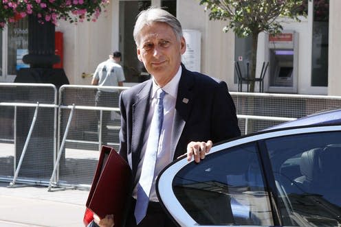 <span class="caption">Is chancellor of the exchequer, Philip Hammond, betting on tech utopia with plans to see autonomous vehicles on UK roads by 2021?</span> <span class="attribution"><a class="link " href="https://commons.wikimedia.org/wiki/Category:Philip_Hammond#/media/File:DOORSTEP_2016-09-09_-_EU_Members_States_Ministers_(29527029036).jpg" rel="nofollow noopener" target="_blank" data-ylk="slk:EU2016SK;elm:context_link;itc:0;sec:content-canvas">EU2016SK</a></span>