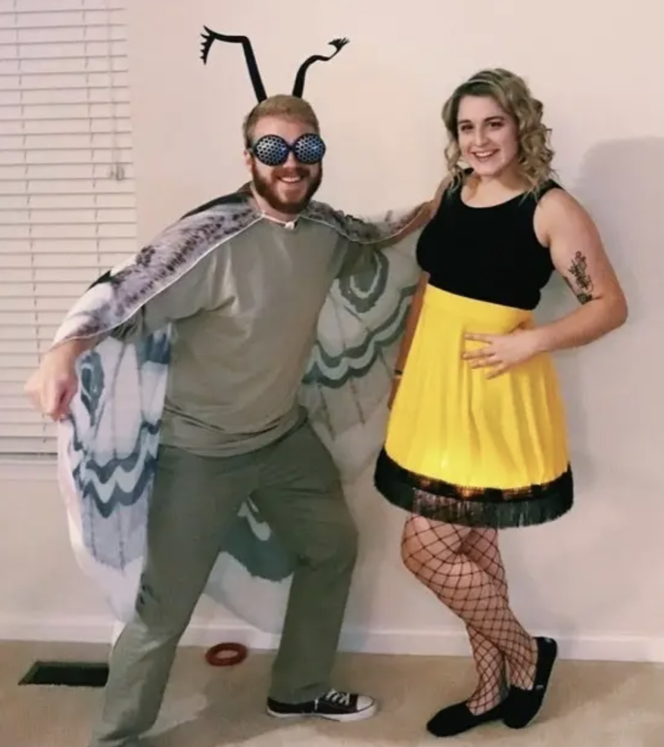 Someone dressed up as a moth and another person dressed as the lamp from "A Christmas Story"