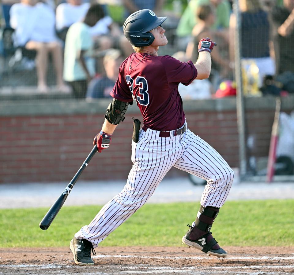 Cole Mathis of Cotuit launches a Bourne pitch for a bases loaded triple in the second inning.