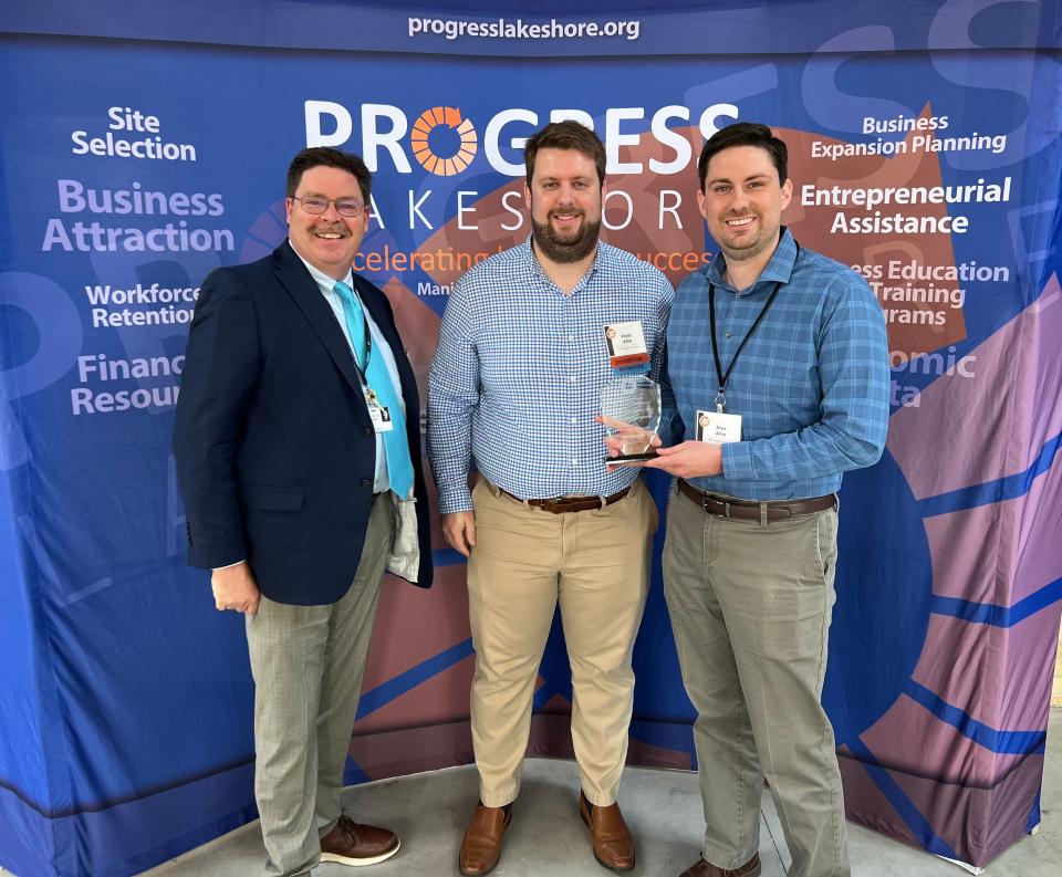 Allie Family Companies collects its Neighborhood Development Award at the 12th annual Progress Lakeshore Excellence in Economic Development Awards May 9.
