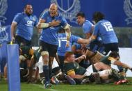 Rugby Union - Rugby Test - Italy v South Africa - Artemio Franchi stadium, Florence, Italy - 19/11/16. Italy's Sergio Parisse celebrates a try scored by teammate Giovanbattista Venditti against South Africa. REUTERS/Alessandro Bianchi