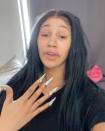 <p>Cardi B took to Instagram to show her 82.4 million followers what she looks like without any make-up at all. In a truly authentic move, the singer posted a video of herself with filter-free bare skin having just woken up, and told her followers that she feels confident like this, 'You can see all the blemishes on my face... you can see my lips so chapped from biting them all night...I just woke up 20 minutes ago, didn't even brush my hair, like, I feel good.'</p><p><a href="https://www.instagram.com/p/CLFQFyHgQKx/" rel="nofollow noopener" target="_blank" data-ylk="slk:See the original post on Instagram;elm:context_link;itc:0;sec:content-canvas" class="link ">See the original post on Instagram</a></p>