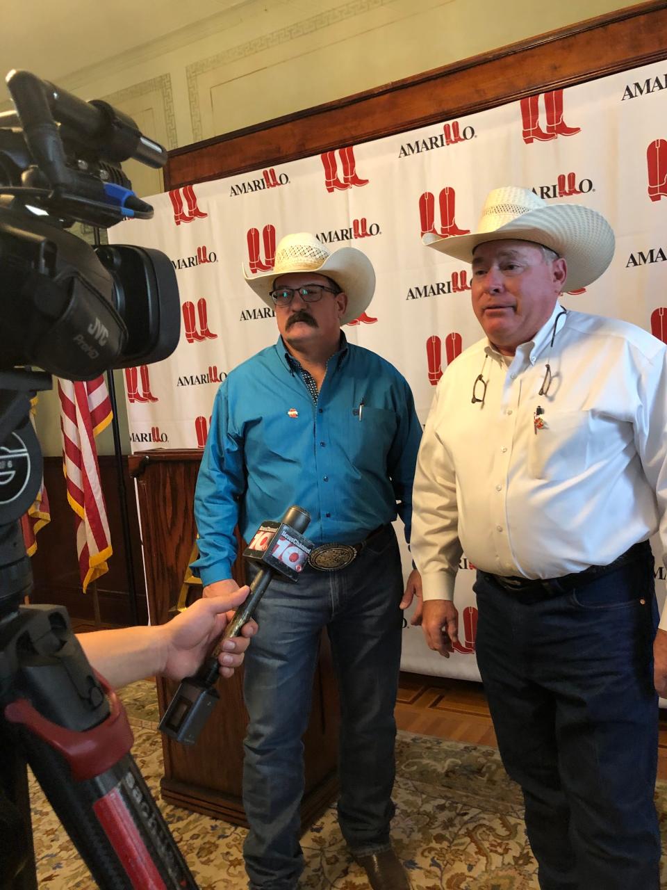 Lance Provence, left, chairman of West Texas Ranch Rodeo, and Randy Whipple, treasurer of WRCA, announce exciting news for ranchers, working cowboys and fans of the sport Wednesday night at the Bivins former home.